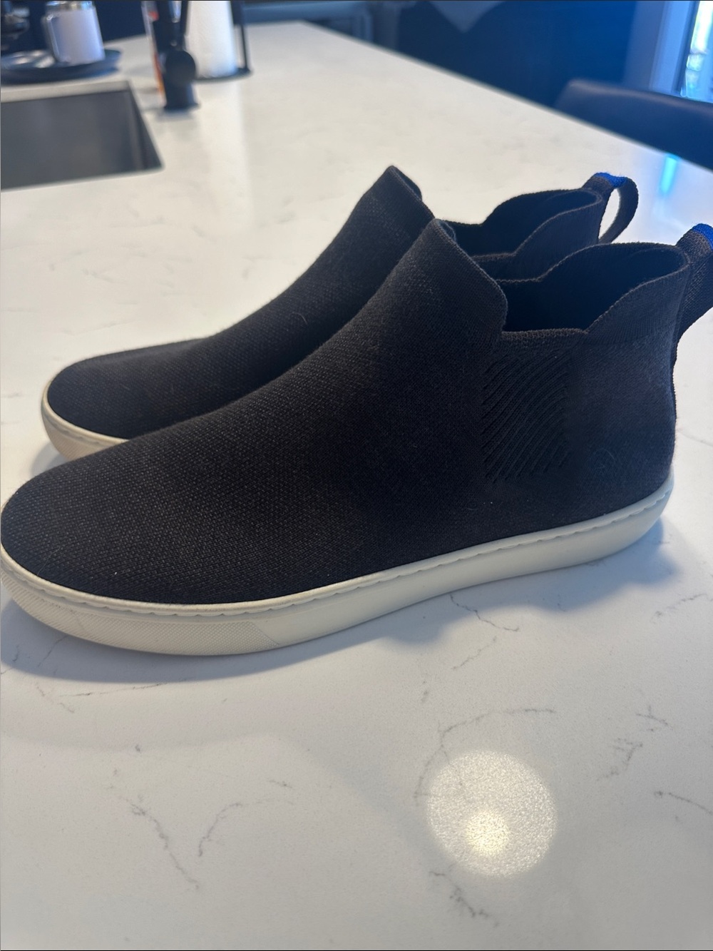 Rothy's Black Knit Slip-On Sneaker with White Sole